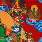 Green Tara Thangka painting with lotus throne, floral branches, celestial Buddhas, and Tibetan Buddhist compassion symbolism.