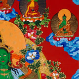 Green Tara Thangka painting with lotus throne, floral branches, celestial Buddhas, and Tibetan Buddhist compassion symbolism.