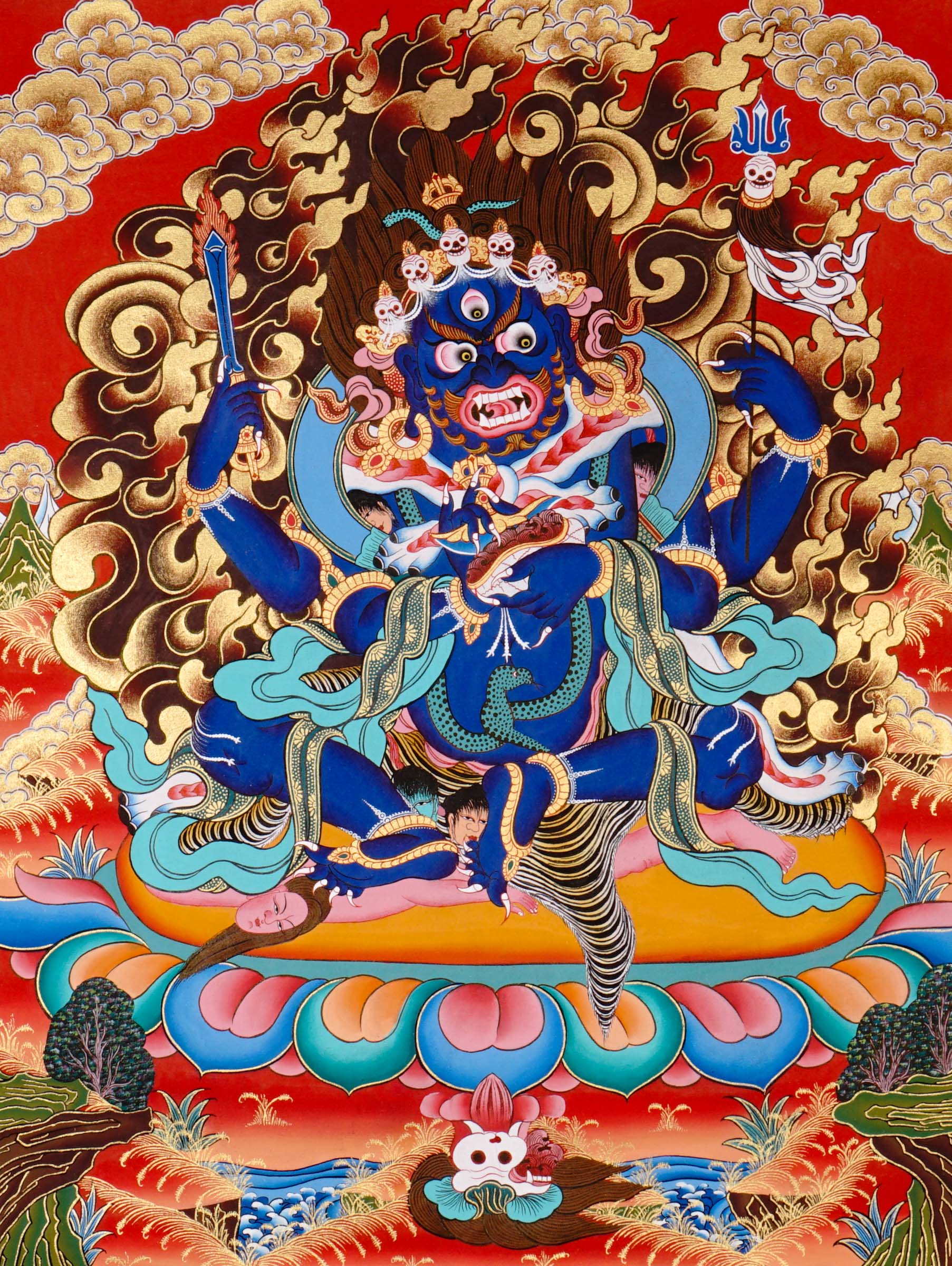 Mahakala Thangka painting with flame halo, lotus base, multiple arms, skull ornaments, and Tibetan Buddhist protector symbolism