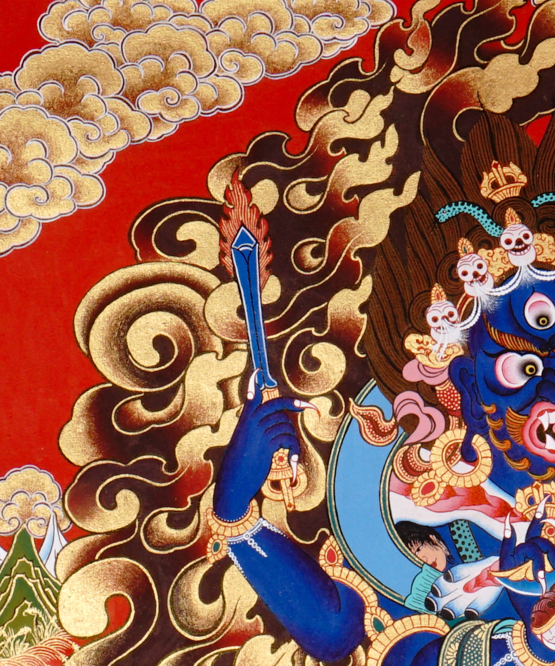 Mahakala Thangka painting with flame halo, lotus base, multiple arms, skull ornaments, and Tibetan Buddhist protector symbolism