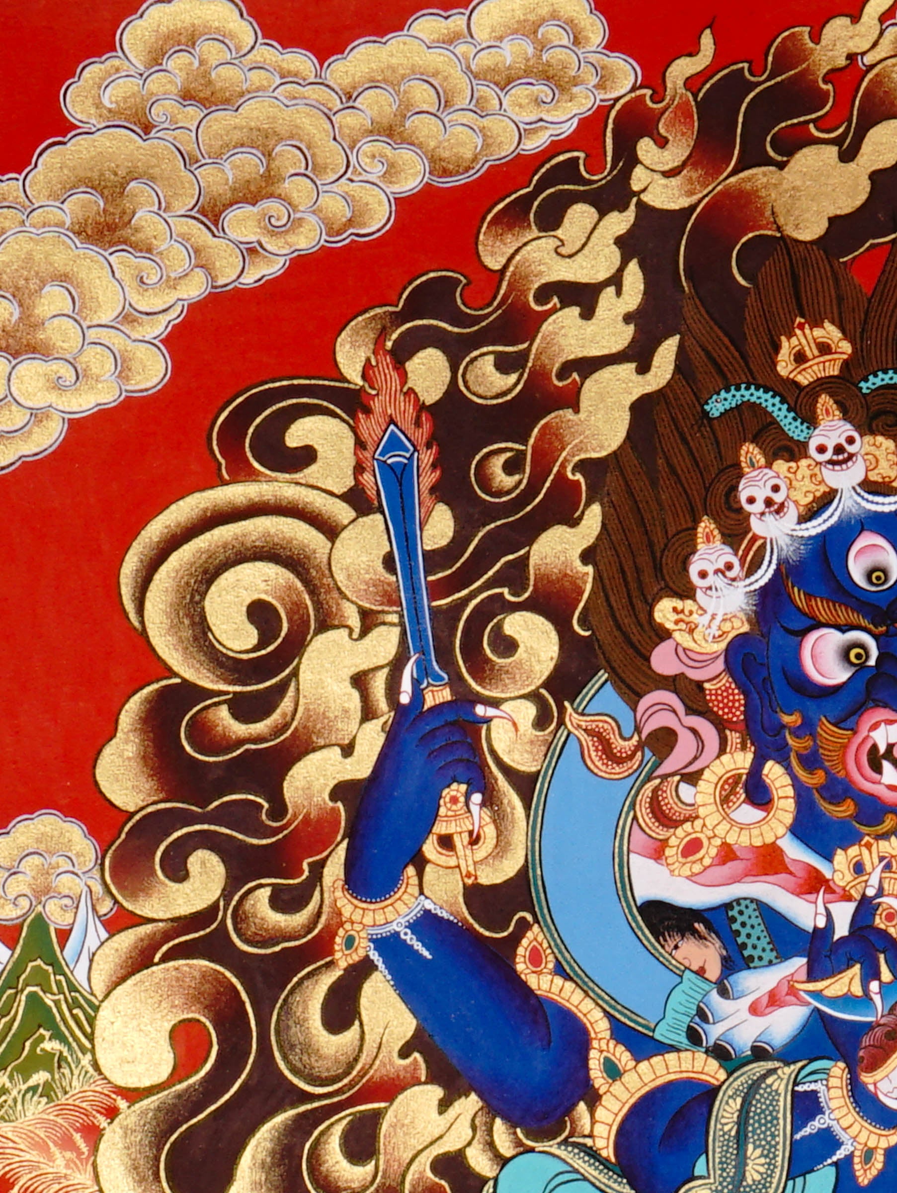 Mahakala Thangka painting with flame halo, lotus base, multiple arms, skull ornaments, and Tibetan Buddhist protector symbolism