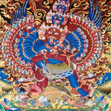 Heruka Thangka painting with multi-faced wrathful deity, flame halo, lotus base, and Tibetan Buddhist tantric symbolism