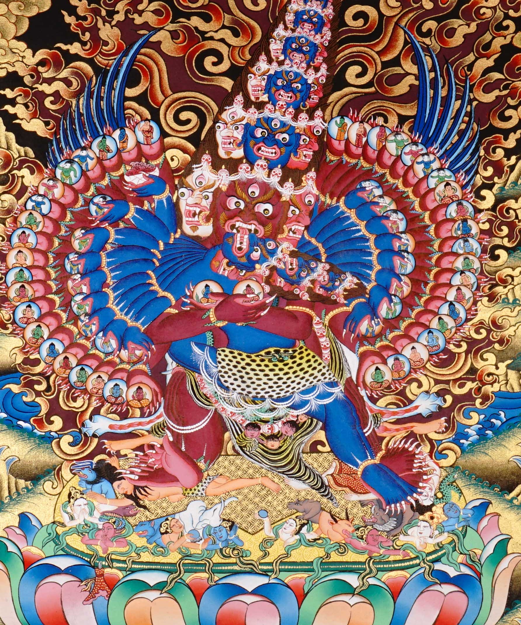 Heruka Thangka painting with multi-faced wrathful deity, flame halo, lotus base, and Tibetan Buddhist tantric symbolism