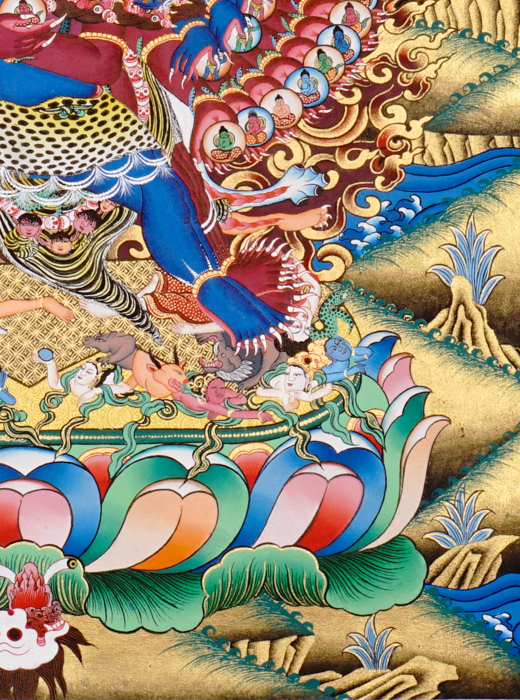 Heruka Thangka painting with multi-faced wrathful deity, flame halo, lotus base, and Tibetan Buddhist tantric symbolism