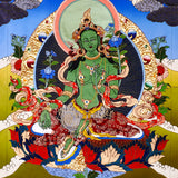 Green Tara thangka painting Tibetan goddess seated on lotus holding blue lotus in detailed traditional composition