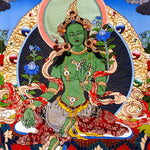 Green Tara thangka painting Tibetan goddess seated on lotus holding blue lotus in detailed traditional composition