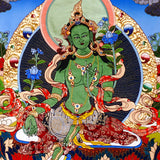 Green Tara thangka painting Tibetan goddess seated on lotus holding blue lotus in detailed traditional composition