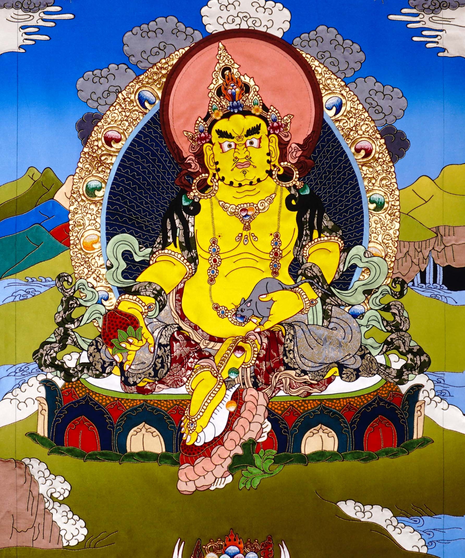 Yellow Zambala thangka painting Tibetan wealth deity seated on lotus holding jewel and mongoose in detailed landscape