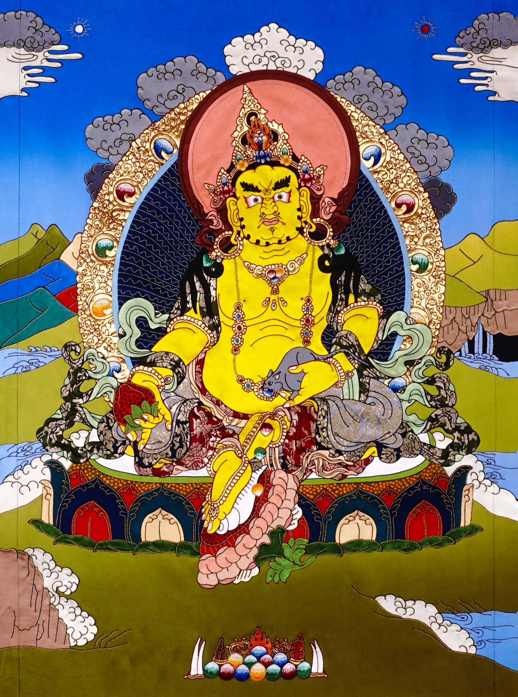 Yellow Zambala thangka painting Tibetan wealth deity seated on lotus holding jewel and mongoose in detailed landscape