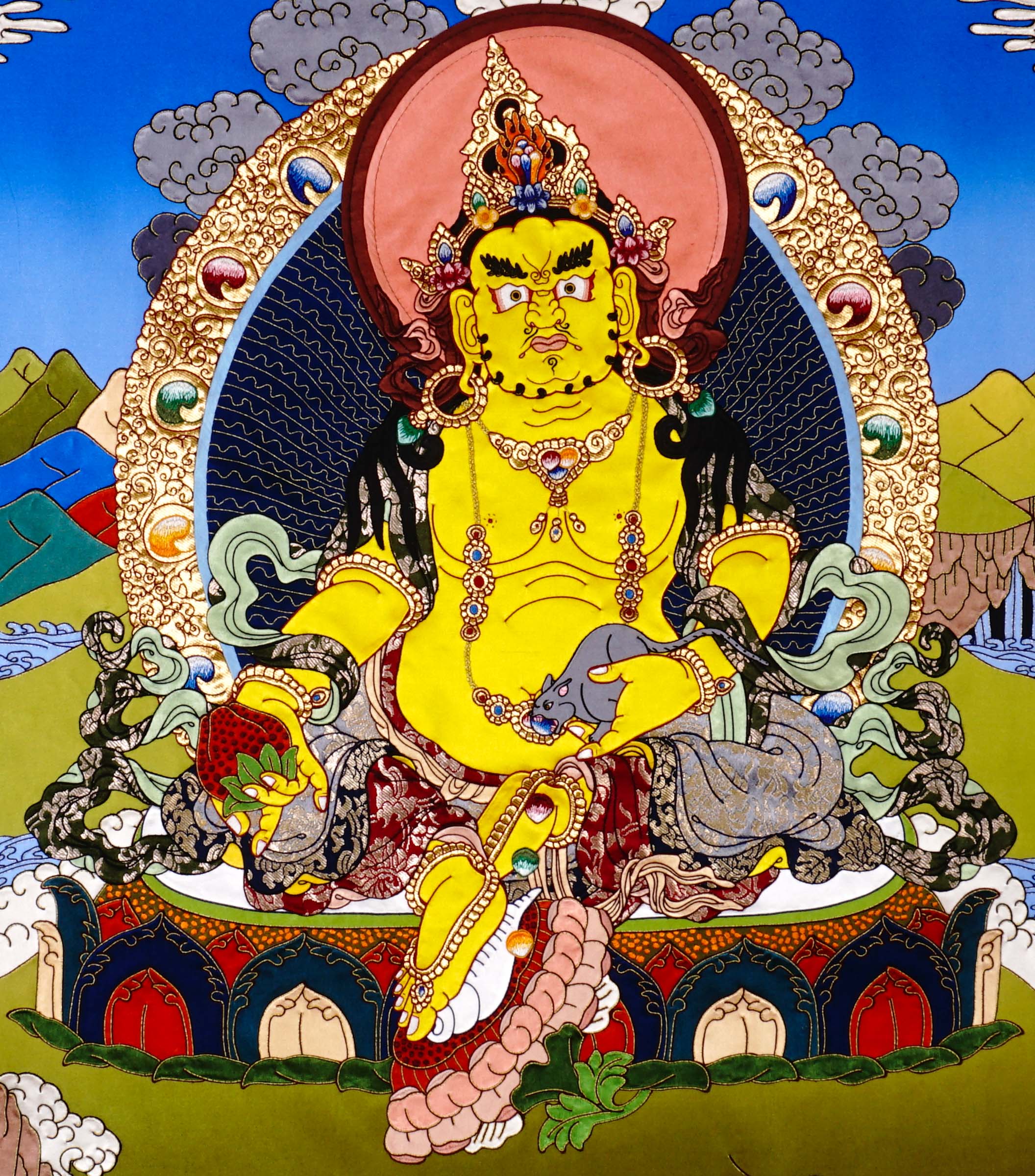 Yellow Zambala thangka painting Tibetan wealth deity seated on lotus holding jewel and mongoose in detailed landscape