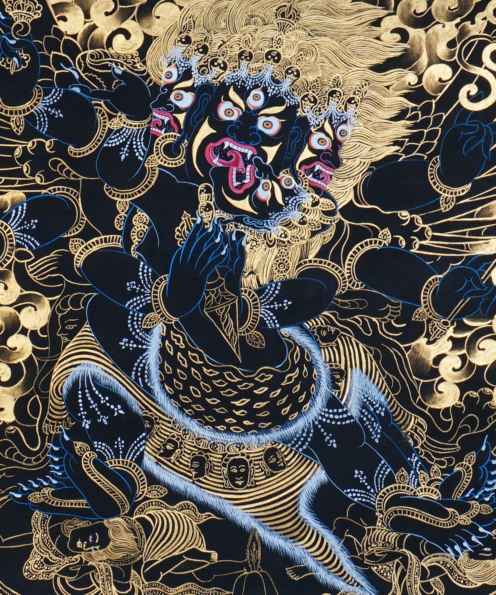 Vajrakilaya Thangka Painting showing Dorje Phurba in a wrathful multi-faced and multi-armed form with ritual implements, flame clouds, lotus base, gold detailing and Himalayan landscape elements.