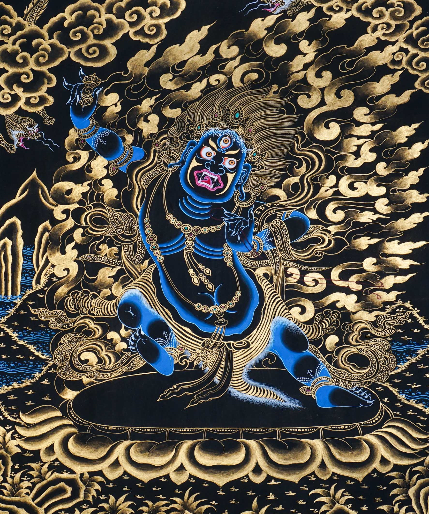 Vajrapani Thangka Painting showing a wrathful Tibetan Buddhist protector deity with multiple faces and arms, ritual implements, gold cloud patterns, flame-like details, lotus base and Himalayan landscape elements