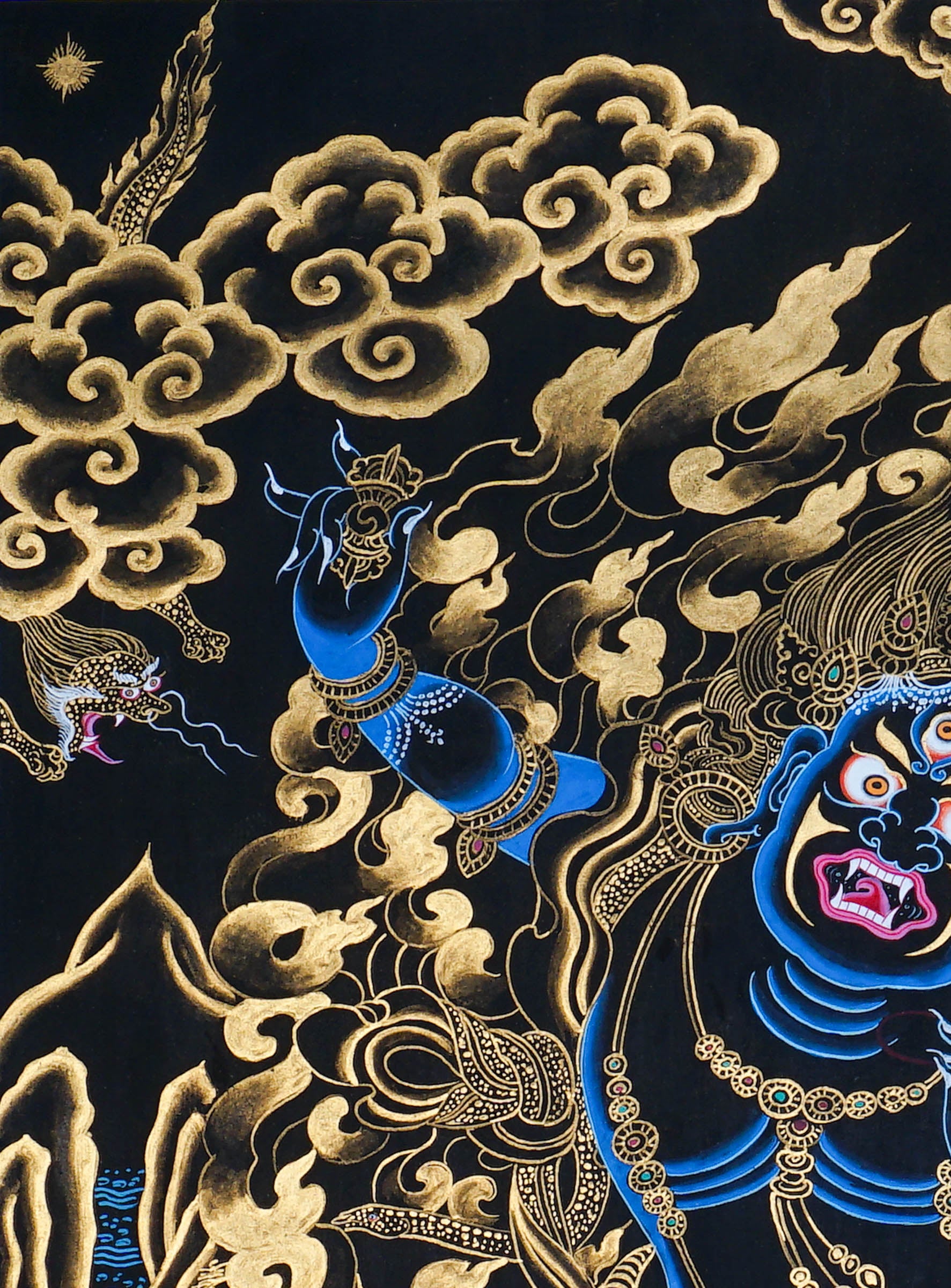 Vajrapani Thangka Painting showing a wrathful Tibetan Buddhist protector deity with multiple faces and arms, ritual implements, gold cloud patterns, flame-like details, lotus base and Himalayan landscape elements