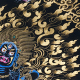 Vajrapani Thangka Painting showing a wrathful Tibetan Buddhist protector deity with multiple faces and arms, ritual implements, gold cloud patterns, flame-like details, lotus base and Himalayan landscape elements