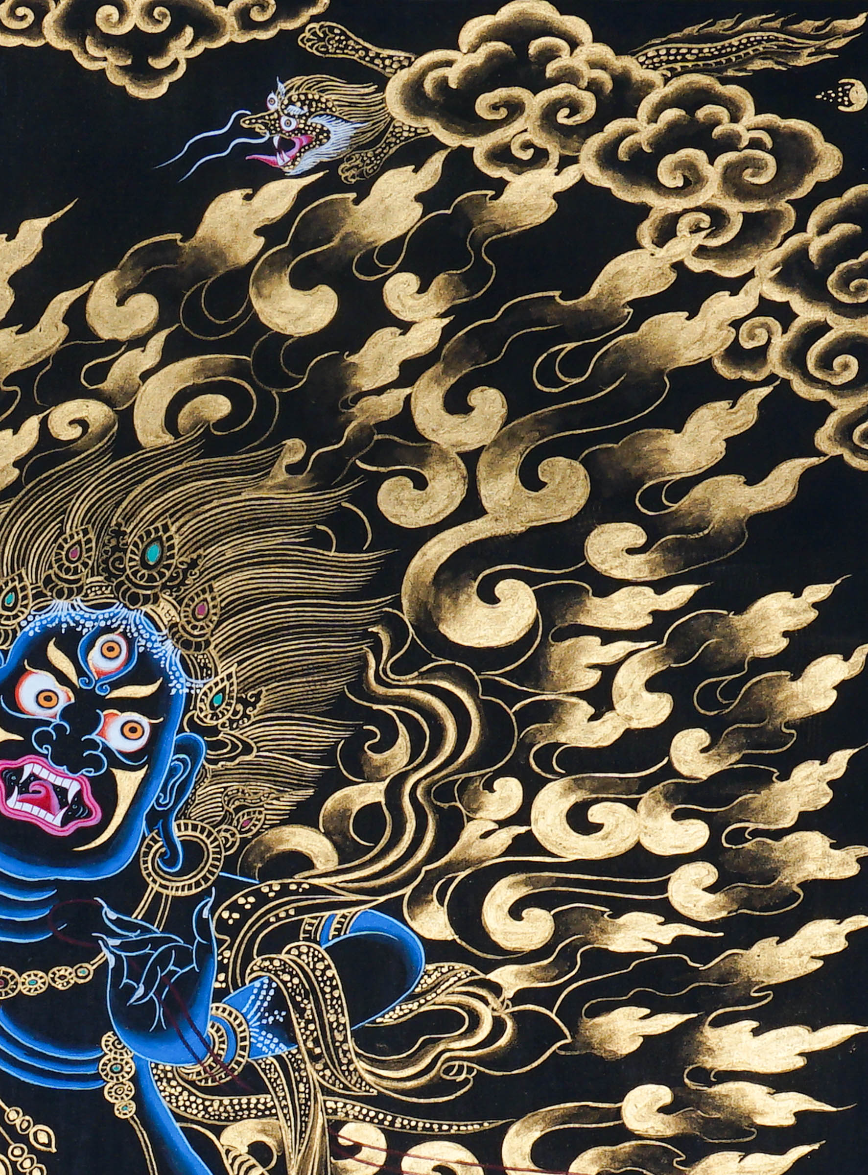 Vajrapani Thangka Painting showing a wrathful Tibetan Buddhist protector deity with multiple faces and arms, ritual implements, gold cloud patterns, flame-like details, lotus base and Himalayan landscape elements