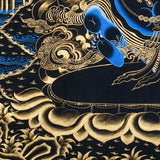 Close-up detail of Vajrapani Thangka Painting, wrathful protector holding a raised vajra within a flame aura