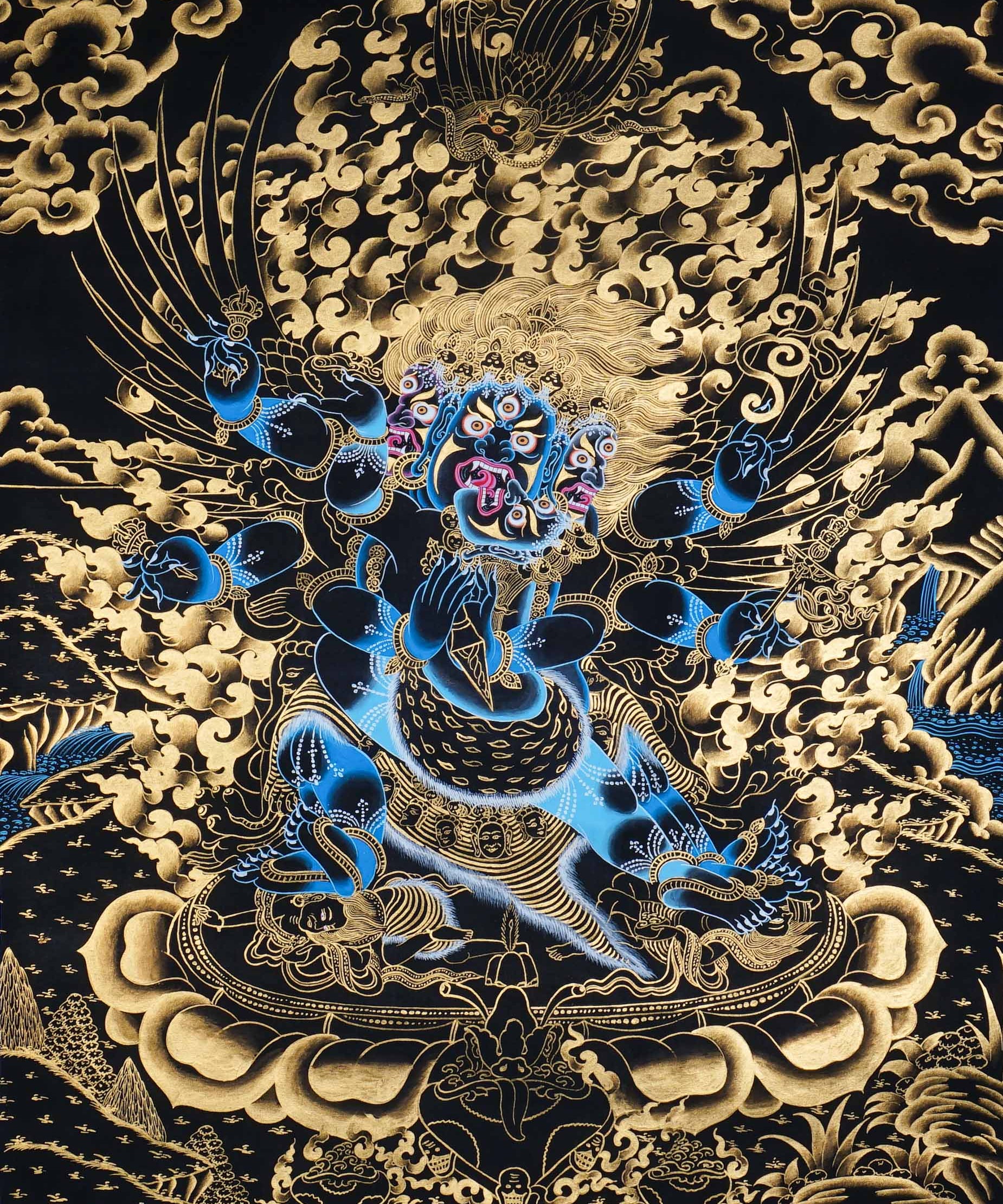 Vajrakilaya Thangka Painting showing Dorje Phurba in a wrathful multi-faced and multi-armed form with ritual implements, flame clouds, lotus base, gold detailing and Himalayan landscape elements.