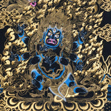 Mahakala thangka painting showing a wrathful blue Mahakala deity with multiple arms, flaming aura, gold clouds, dragon motif, and black background in traditional Tibetan Buddhist style.
