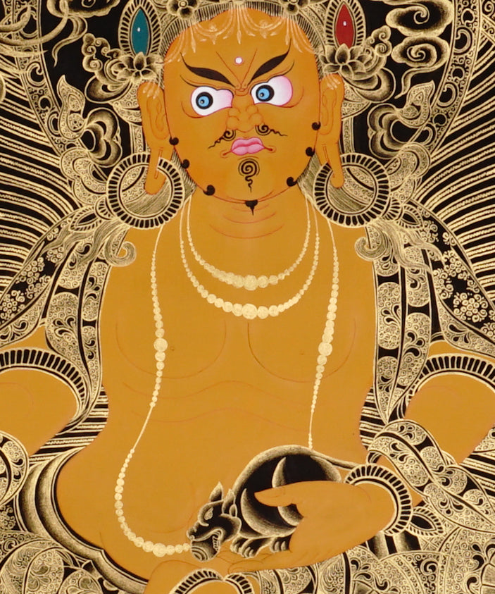 Yellow Zambhala Thangka painting with gold detailing, lotus throne, symbolic birds, and Tibetan Buddhist prosperity symbolism.