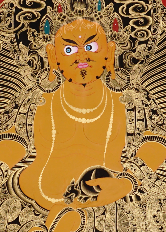 Yellow Zambhala Thangka painting with gold detailing, lotus throne, symbolic birds, and Tibetan Buddhist prosperity symbolism.