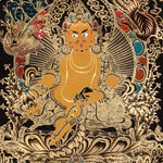 Yellow Zambala Thangka painting with gold detailing, lotus throne, symbolic birds, and Tibetan Buddhist prosperity symbolism.