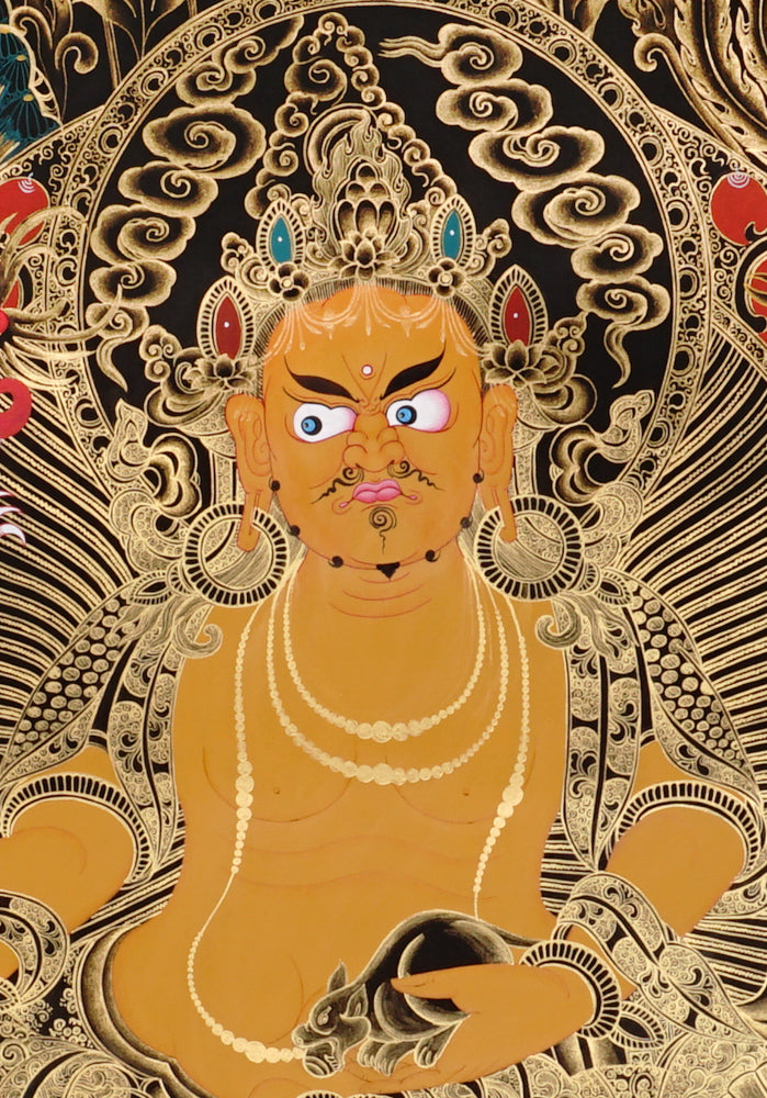 Yellow Zambala Thangka painting with gold detailing, lotus throne, symbolic birds, and Tibetan Buddhist prosperity symbolism.