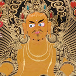 Yellow Zambala Thangka painting with gold detailing, lotus throne, symbolic birds, and Tibetan Buddhist prosperity symbolism.