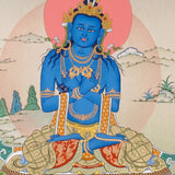 Vajradhara Thangka painting with blue Buddha form, crossed arms, lotus throne, and Tibetan Buddhist primordial enlightenment symbolism.