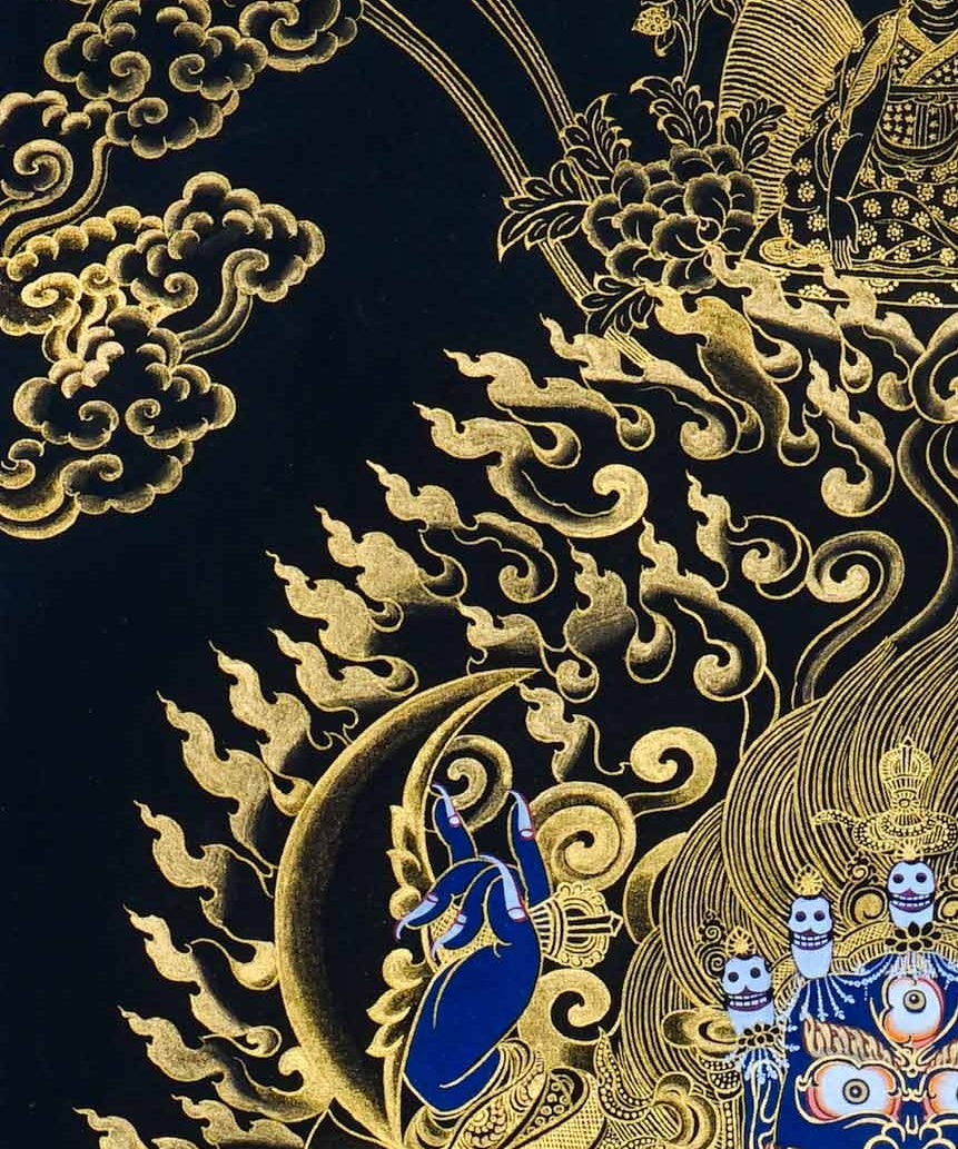 Kagyu Mahakal Thangka Painting showing a wrathful Tibetan Buddhist Dharma protector in black and gold style with blue details, skull crown, skull cup, flame aura, lotus base, gold clouds, lineage figure and Himalayan landscape.