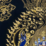 Kagyu Mahakal Thangka Painting showing a wrathful Tibetan Buddhist Dharma protector in black and gold style with blue details, skull crown, skull cup, flame aura, lotus base, gold clouds, lineage figure and Himalayan landscape.
