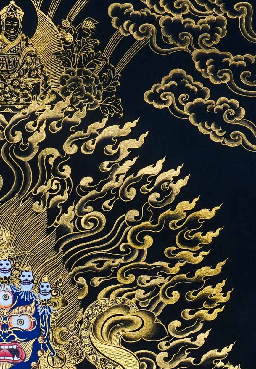 Kagyu Mahakal Thangka Painting showing a wrathful Tibetan Buddhist Dharma protector in black and gold style with blue details, skull crown, skull cup, flame aura, lotus base, gold clouds, lineage figure and Himalayan landscape.
