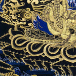 Kagyu Mahakal Thangka Painting showing a wrathful Tibetan Buddhist Dharma protector in black and gold style with blue details, skull crown, skull cup, flame aura, lotus base, gold clouds, lineage figure and Himalayan landscape.