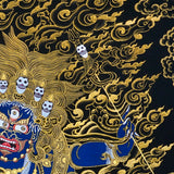 Close-up detail of Six Hand Mahakala Thangka Painting, six-armed wrathful protector in black, gold and blue with flame motifs and lotus base