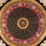 Tibetan mantra mandala artwork with gold script on black background