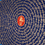 Tibetan mantra mandala with eight auspicious symbols and sacred script