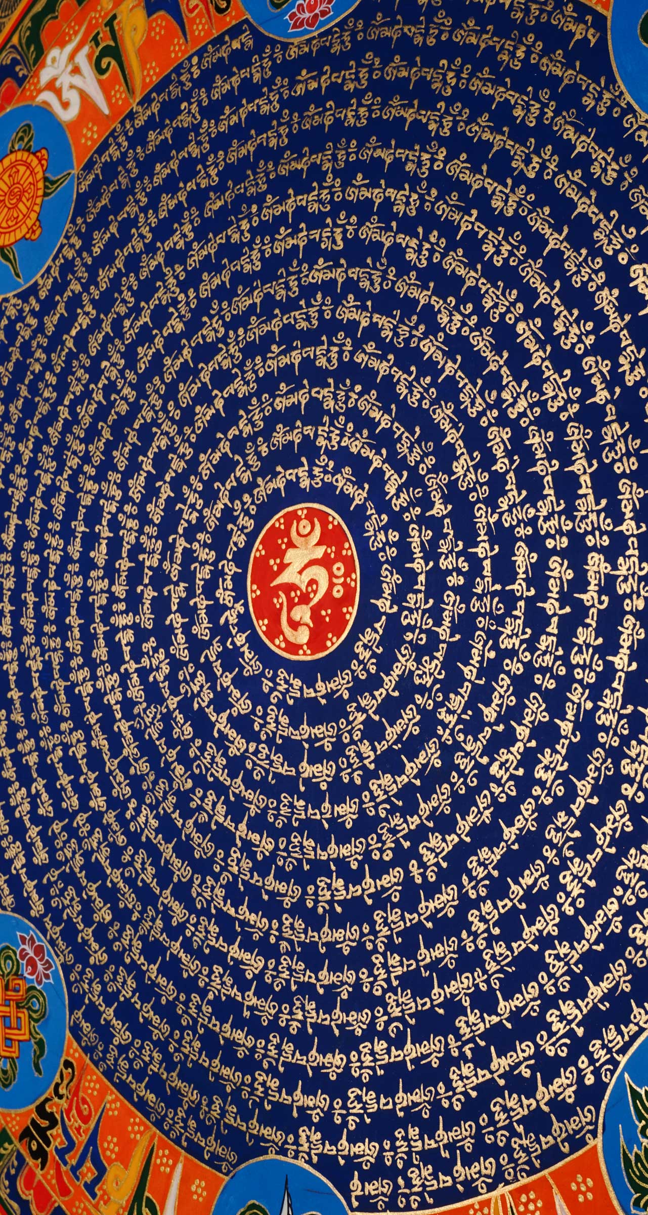 Tibetan mantra mandala with eight auspicious symbols and sacred script