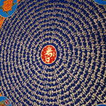 Tibetan mantra mandala with eight auspicious symbols and sacred script