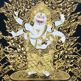 Six Hand White Mahakala Thangka Painting showing a white Tibetan Buddhist protector deity with six arms, wrathful expression, ritual implements, flame aura, gold cloud details, offering symbols and lotus base in black and gold style.