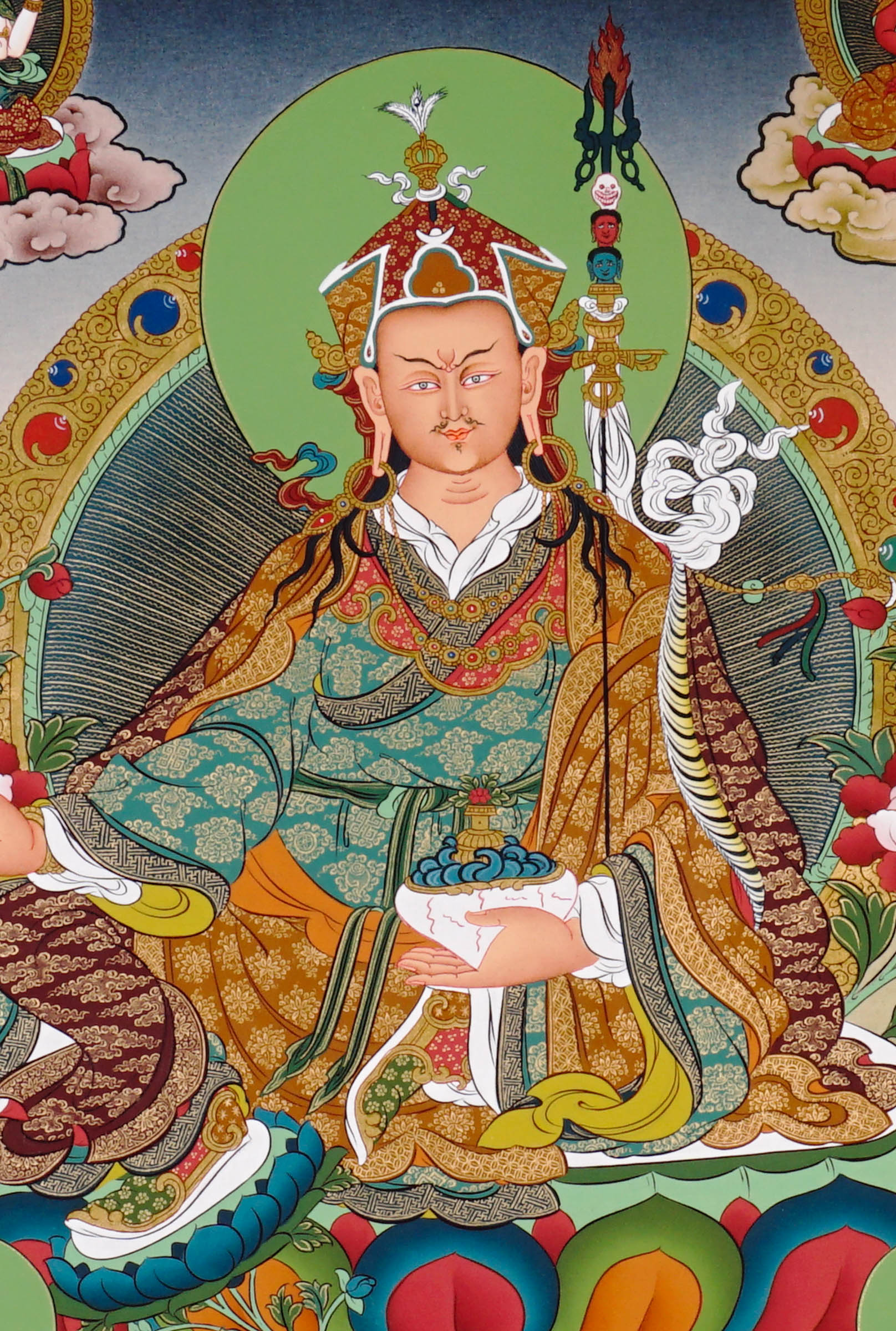 Guru Rinpoche thangka painting featuring Padmasambhava seated on a lotus throne with vajra, skull cup, offering bowl, surrounding deities, mountains and flowing water 