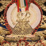 Dukkar thangka painting featuring the White Umbrella Goddess Sitatapatra with many arms, sacred implements, flame aura, gold-tone details