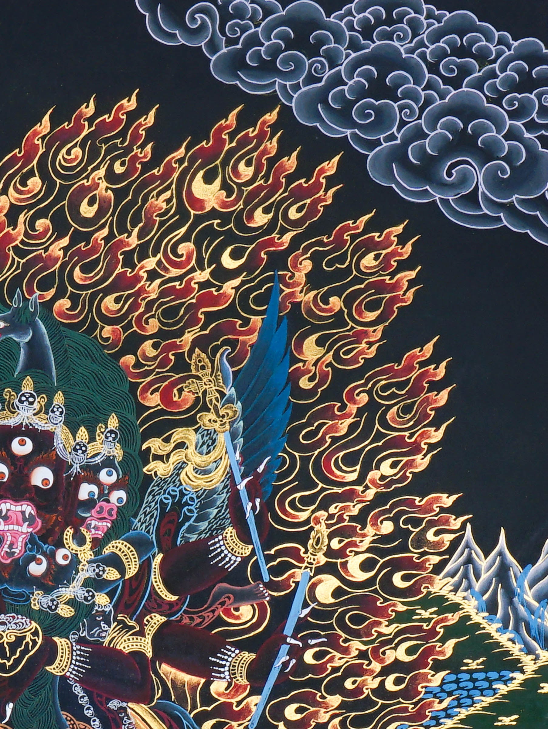 Close-up detail of Vajrakilaya Thangka Painting, wrathful Vajrakilaya in black and gold with multiple arms, skull crown and lotus base