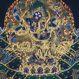 Six Hand Mahakala Thangka Painting showing a wrathful Tibetan Buddhist protector deity with six arms, flame aura, ritual implements, offering symbols, lotus base and Himalayan landscape in black, gold, blue and red tones.