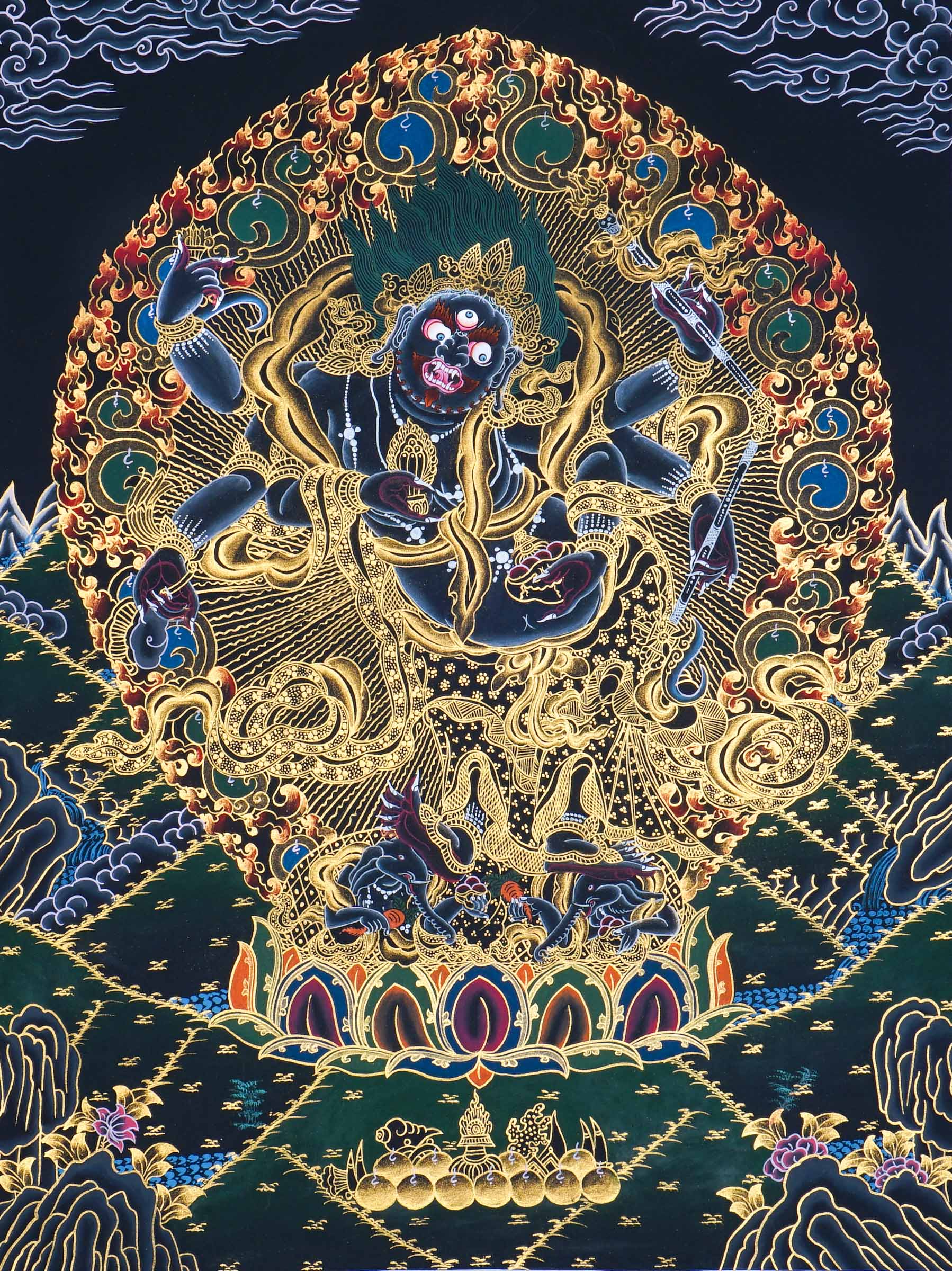 Six Hand Mahakala Thangka Painting showing a wrathful Tibetan Buddhist protector deity with six arms, flame aura, ritual implements, offering symbols, lotus base and Himalayan landscape in black, gold, blue and red tones.