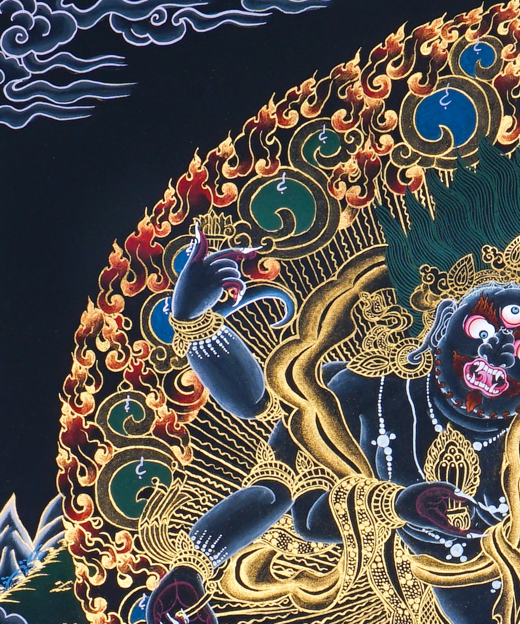 Six Hand Mahakala Thangka Painting showing a wrathful Tibetan Buddhist protector deity with six arms, flame aura, ritual implements, offering symbols, lotus base and Himalayan landscape in black, gold, blue and red tones.
