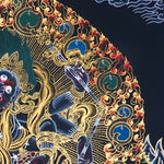 Six Hand Mahakala Thangka Painting showing a wrathful Tibetan Buddhist protector deity with six arms, flame aura, ritual implements, offering symbols, lotus base and Himalayan landscape in black, gold, blue and red tones.