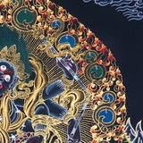 Six Hand Mahakala Thangka Painting showing a wrathful Tibetan Buddhist protector deity with six arms, flame aura, ritual implements, offering symbols, lotus base and Himalayan landscape in black, gold, blue and red tones.