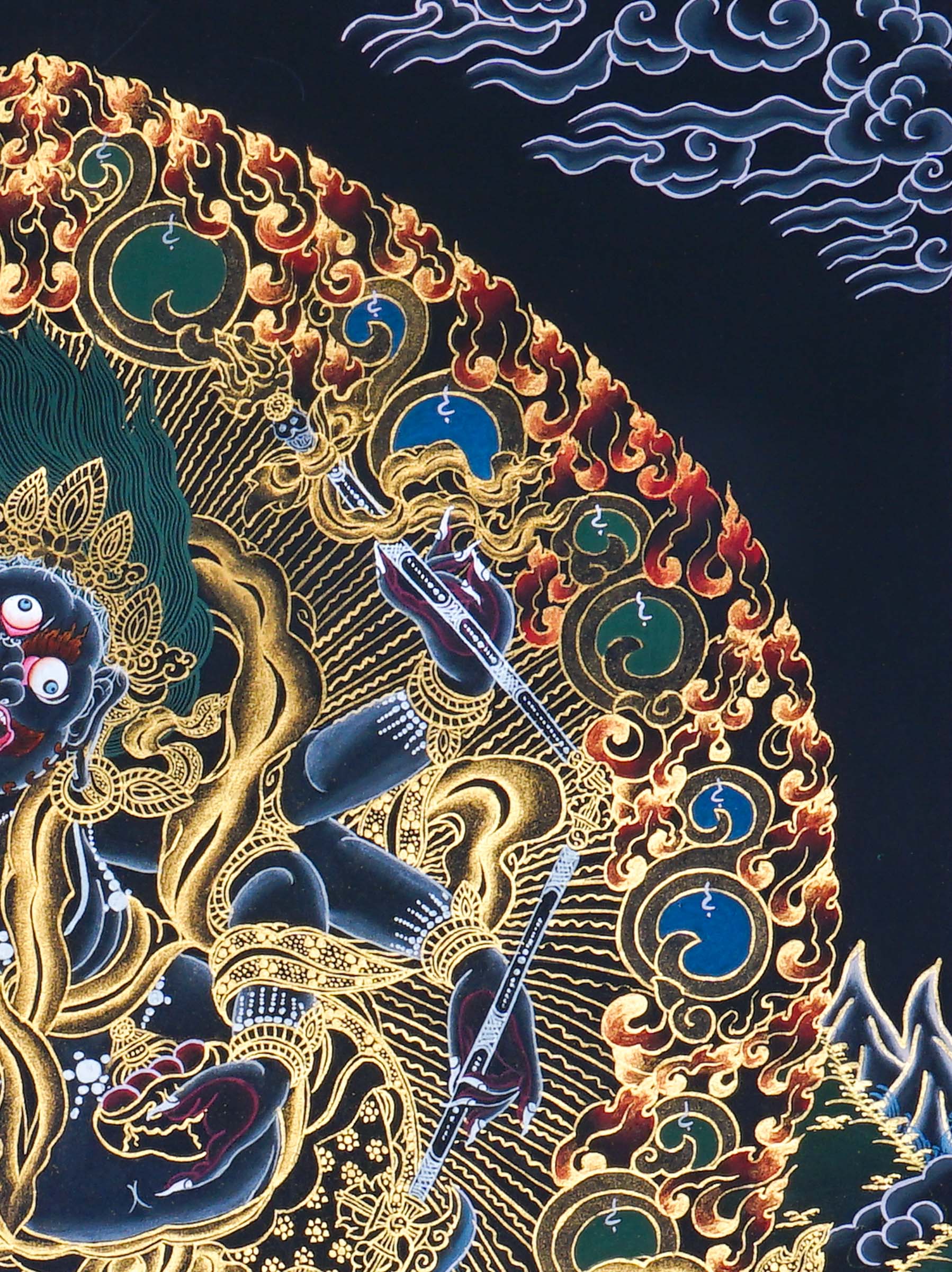 Six Hand Mahakala Thangka Painting showing a wrathful Tibetan Buddhist protector deity with six arms, flame aura, ritual implements, offering symbols, lotus base and Himalayan landscape in black, gold, blue and red tones.