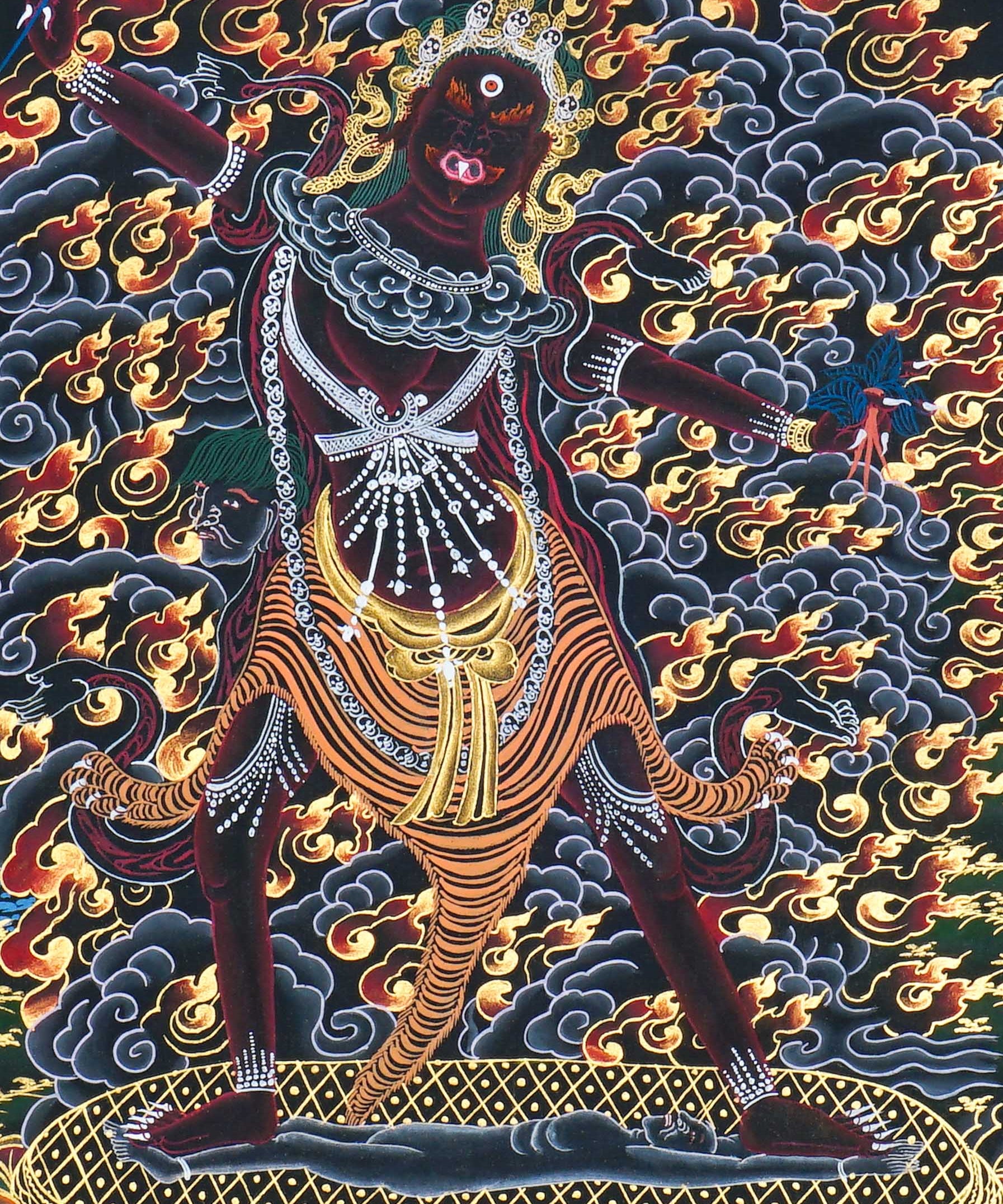 Close up of Ekajati Thangka Painting showing a wrathful female protector deity surrounded by flames, dark clouds.