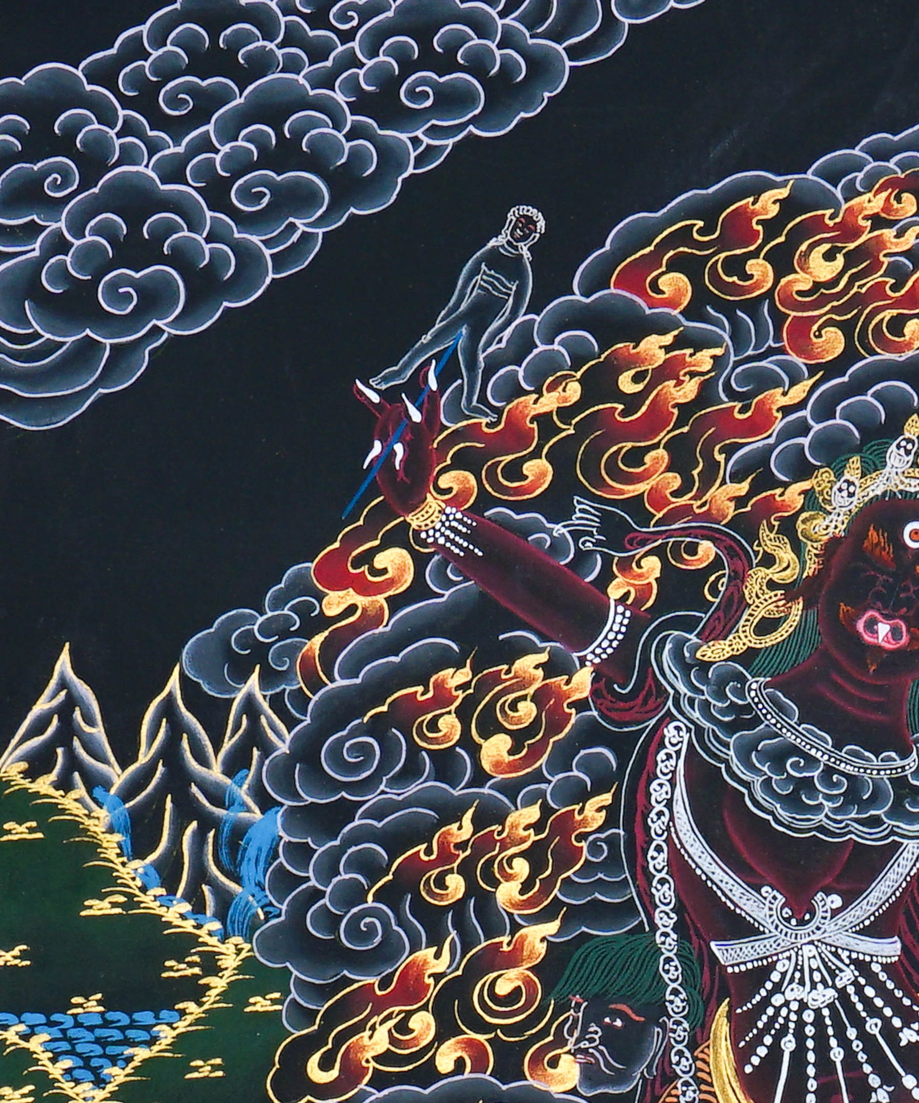 Close up of Ekajati Thangka Painting showing a wrathful female protector deity surrounded by flames, dark clouds.