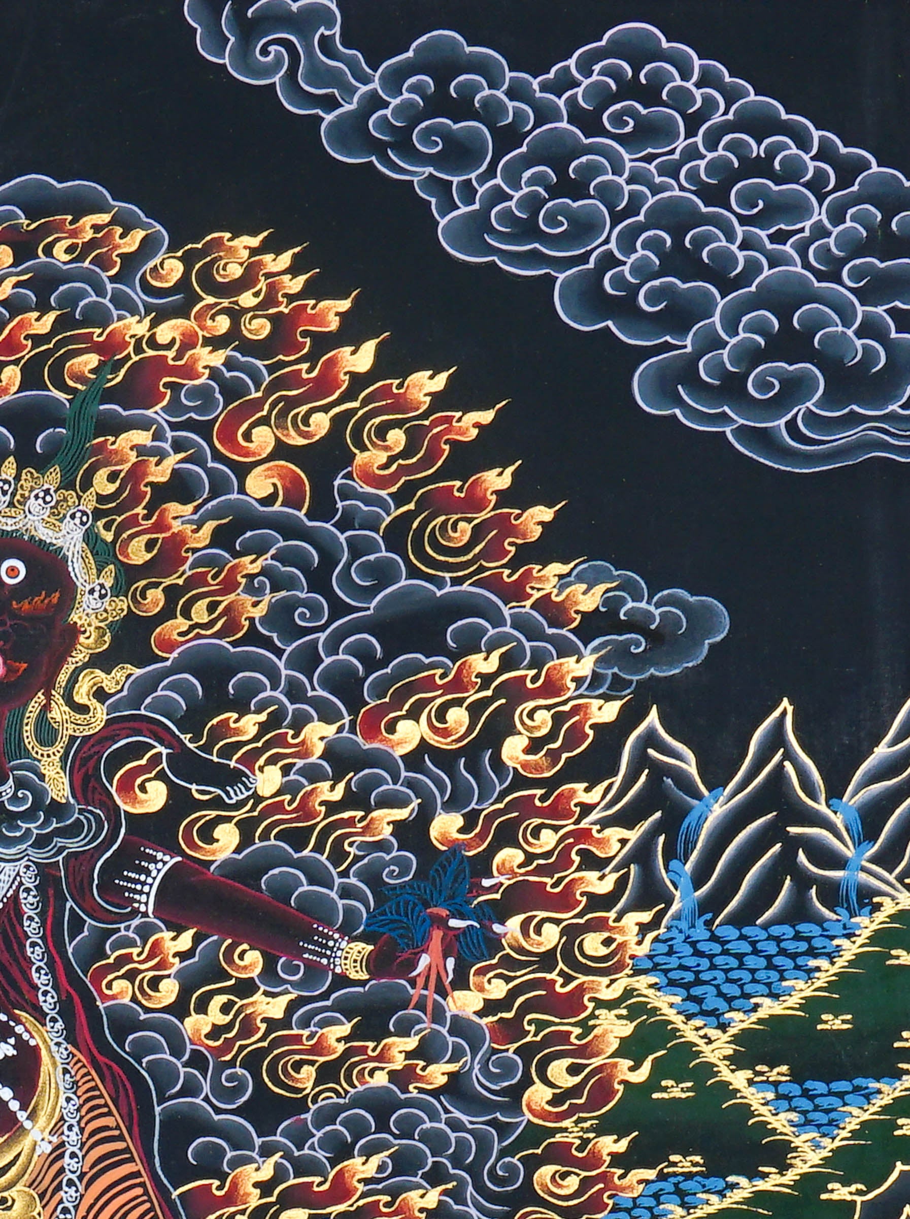 Close up of Ekajati Thangka Painting showing a wrathful female protector deity surrounded by flames, dark clouds.